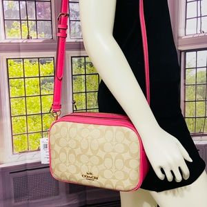 COACH Jes Crossbody Bag In Signature Canvas in Pink